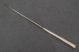 A large 19th century silver handled button hook of a twisted rope design, marks for Chester 1887