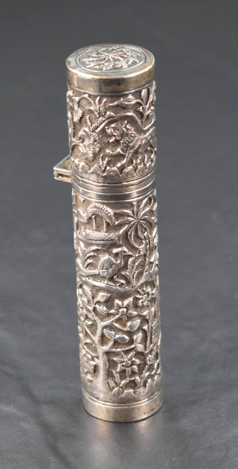 A late 19th/early 20th century Indian or Burmese white metal bodkin holder or etui, of cylindrical