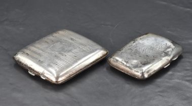 Two early 20th century silver cigarette cases, one having engine-turned decoration the other