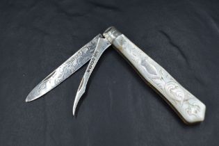 An attractive Victorian Mother-of-Pearl mounted and silver bladed pocket knife, with engraved