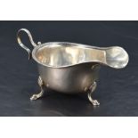 A George V silver sauce or gravy boat, of traditional design with egg-and-dart moulded rim, generous