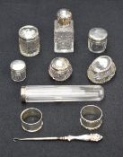 A selection of late 19th and 20th century silver mounted dressing table wares, including a cut glass