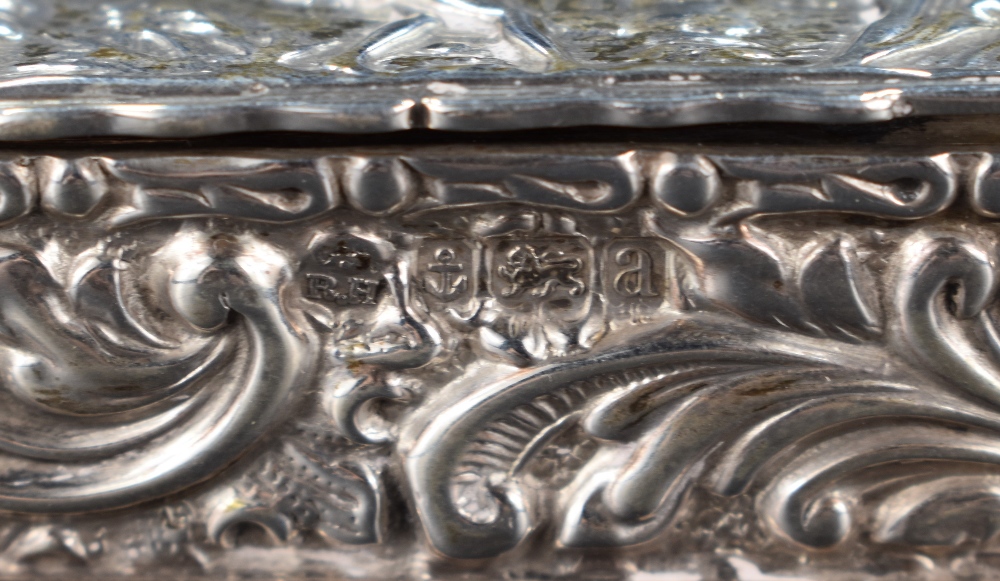 A late Victorian silver box, of hinged rectangular form, the cover embossed with musician and dancer - Image 3 of 3