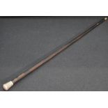 A 19th century white metal mounted rosewood walking cane, the tapering rosewood shaft surmounted