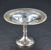 An early 20th century silver pedestal dish, of circular form with pierced edge detail and raised