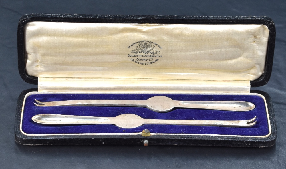 A pair of cased George V silver lobster picks, of plain traditional design with marks for London