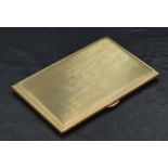 An impressive 1930's 9ct gold cigarette case, of piano hinged rectangular form with engine-turned