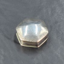 An imported silver 19th century design pill box, of domed and hinged hexagonal form with engraved