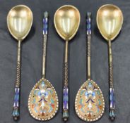 A group of five late 19th/early 20th century Russian enamelled gilt metal spoons, the tear-drop