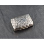 A Regency period silver vinaigrette, of hinged rectangular form with engraved foliate detail and