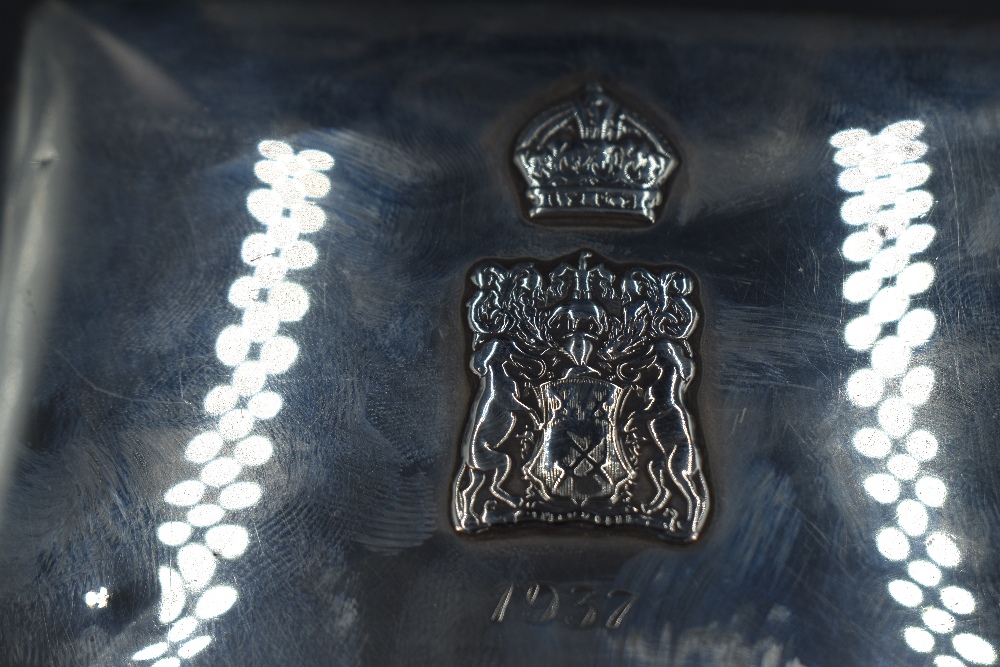 A George V silver cigarette box, of hinged rectangular form the cover embossed with a Crown - Image 2 of 5