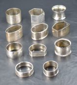 A group of eleven silver napkin rings, various shapes, age, makers and design, gross lot weight