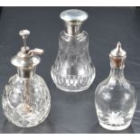 A group of five silver topped cut-glass items, to include perfume atomiser with marks for Birmingham