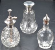 A group of five silver topped cut-glass items, to include perfume atomiser with marks for Birmingham
