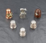 A group of three silver thimbles, one decorated with rosettes, Sheffield 1990, maker CHH (Hoopers