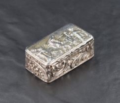A late Victorian silver box, of hinged rectangular form, the cover embossed with musician and dancer