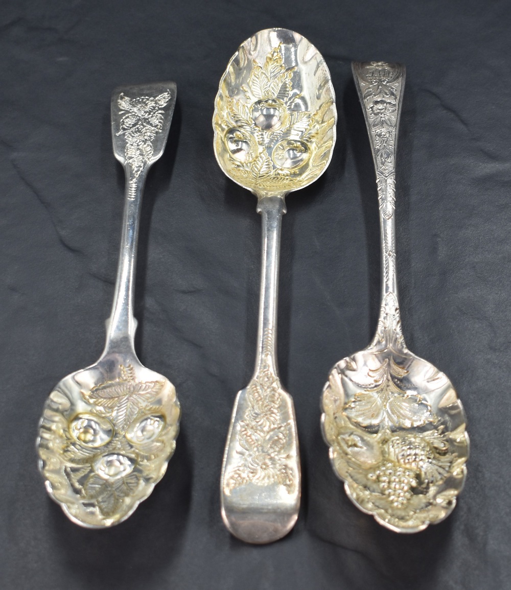 Three 19th century silver berry spoons, two in the fiddle pattern having marks for London 1828, - Image 2 of 3