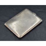 A 1930's silver cigarette case, of hinged rectangular form with engine-turned surface detail and