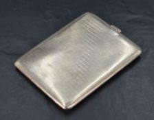 A 1930's silver cigarette case, of hinged rectangular form with engine-turned surface detail and