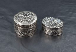 A .925 grade imported Hanau silver pill box, of oval hinged form decorated with classical figural