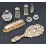 A selection late 19th and early 20th century silver mounted dressing table wares, including four cut