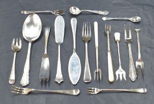 A group of miscellaneous silver flatware, to include spoons, condiment spoons, butter knives, pickle