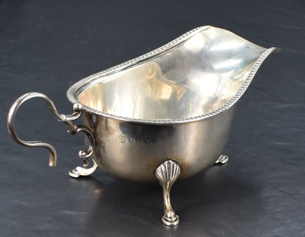 A George V silver sauce or gravy boat, of traditional design with egg-and-dart moulded rim, generous - Image 4 of 4