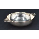 A George VI silver quaich, of traditional design with stylised scroll and pierced shell design