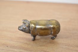 A novelty white metal vesta case, in the form of a pig, with hinged head, measuring 5cm long