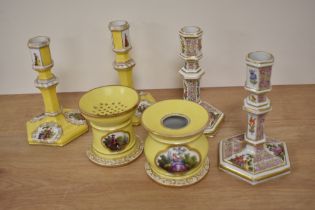 A small collection of 19th Century continental porcelain, of Berlin style and against a yellow