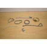 A collection of paste set costume jewellery including necklaces, bracelets and a silver cuff