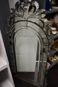 A 20th Century Venetian style etched and bevelled glass overmantle pier glass/ mirror, of arched