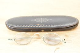 A pair of Antique spectacles with inlaid wooden case.