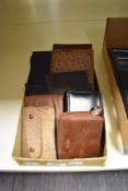 A selection of vintage and modern purses and wallets, predominantly leather.