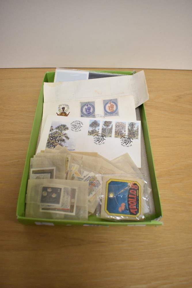 A selection of loose stamps, first day covers, of foreign interest.