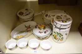A collection of Royal Worcester 'Evesham' and a similarly designed storage jar, including Tureen and