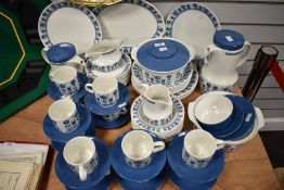 An extensive selection of mid century Johnson Bros table ware, having blue floral pattern to white