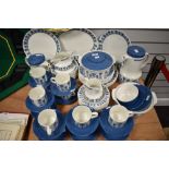 An extensive selection of mid century Johnson Bros table ware, having blue floral pattern to white