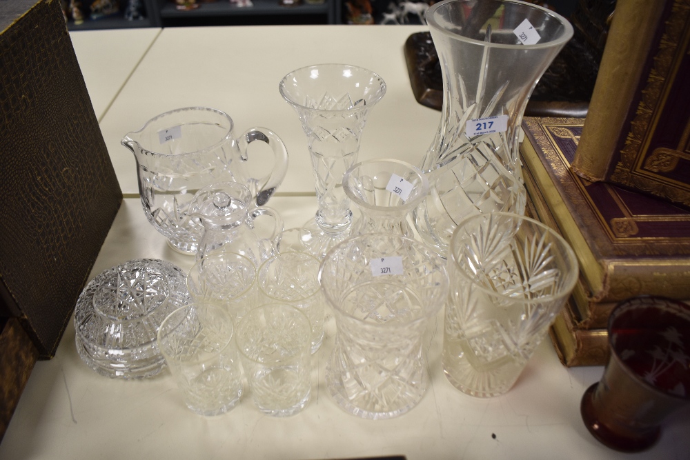 A collection of glass, including cut glass vases, jug, tumblers etc.