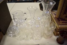 A collection of glass, including cut glass vases, jug, tumblers etc.