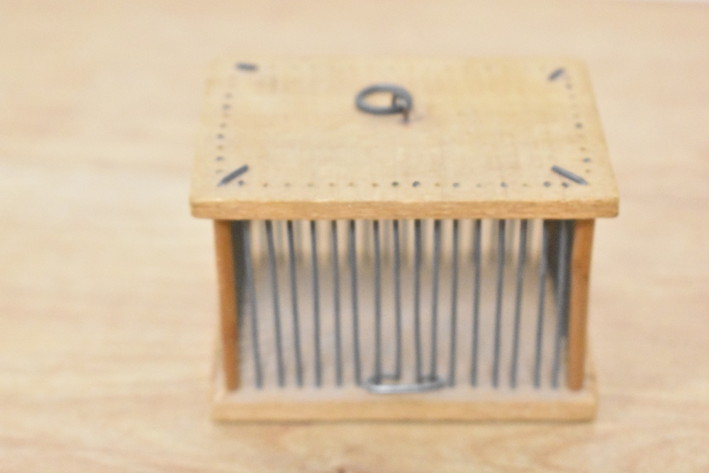 A 20th Century wooden cricket cage, of rectangular form, measuring 6cm x 8cm x 5cm