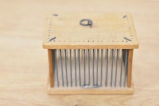 A 20th Century wooden cricket cage, of rectangular form, measuring 6cm x 8cm x 5cm