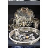 An assorted collection of silver plated ware, to include an egg cruet stand, galleried drinks trays,