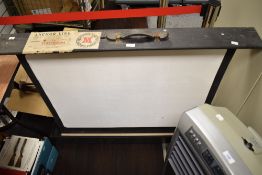 A vintage projector screen, having paper Anchor line, Eastern service, Bombay to Liverpool label.