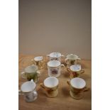 A collection of 19th/20th Century Royal Worcester porcelain tyg and loving cups, the largest