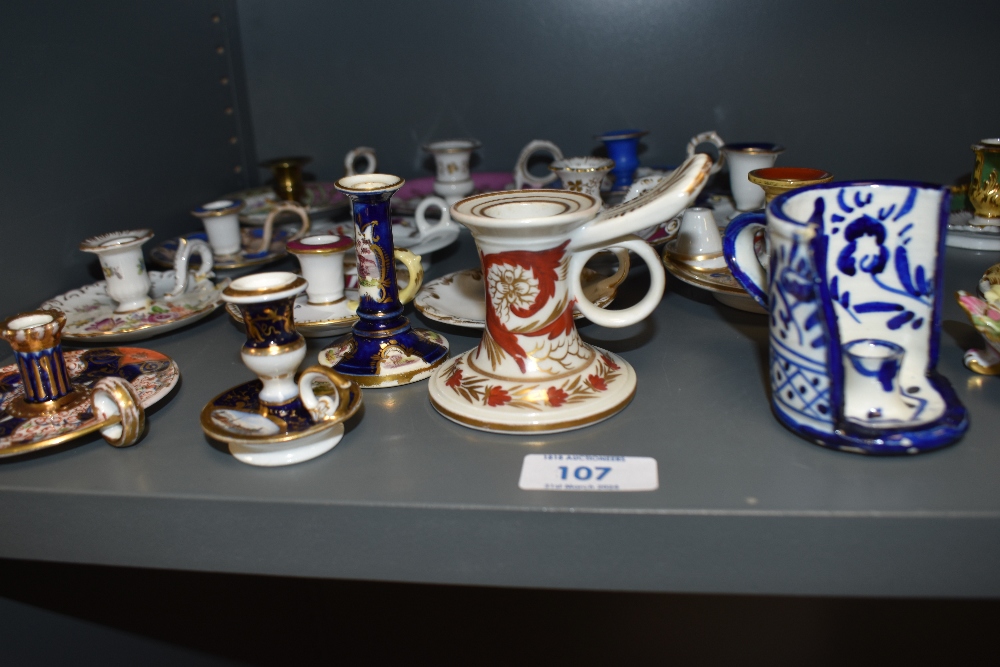 A collection of vintage ceramic candlesticks, including Staffordshire and one bearing crossed swords - Bild 4 aus 13