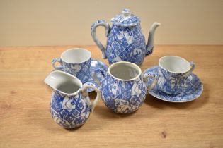 A 20th Century Chinese blue and white teapot, with bamboo effect handle, together with two coffee