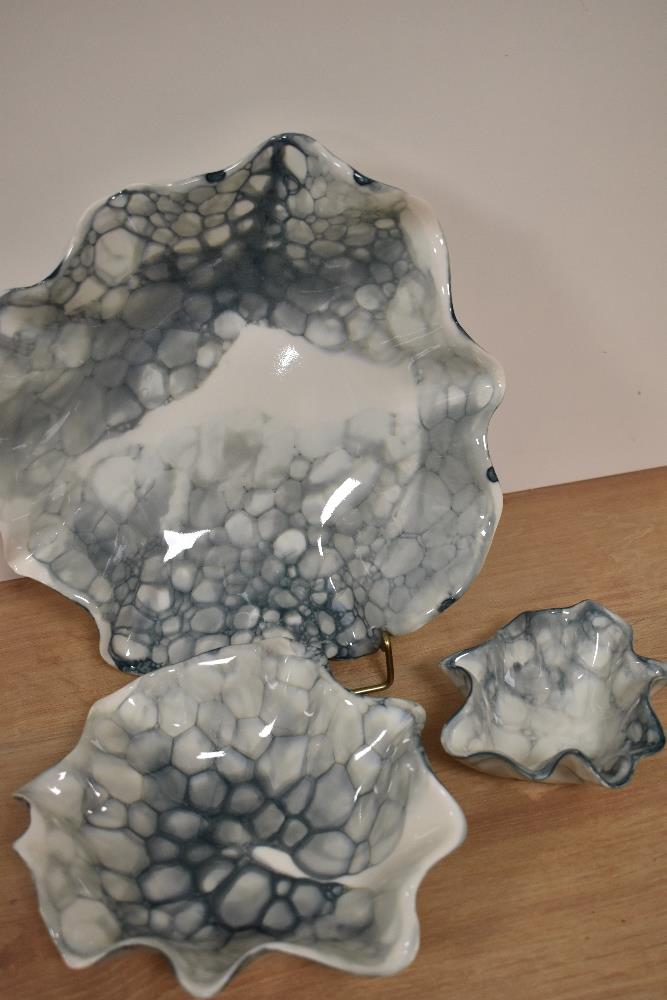 Three Deborah Brett ceramic dishes, decorated in her signature 'bubble glaze', the largest - Image 2 of 3