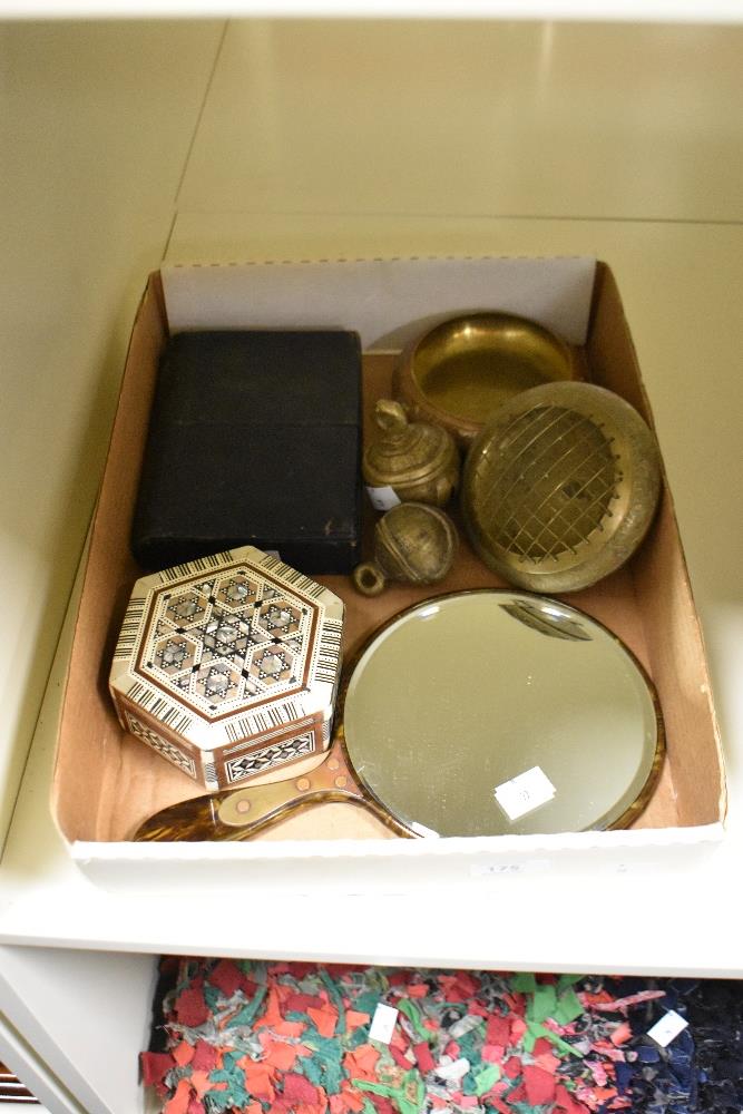 A vintage tortoiseshell effect hand mirror, two cow bells, a micro mosaic box and a rose bowl.