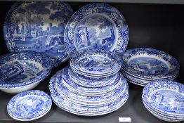 A quantity of Spode Italian blue and white tableware, of various designs, including salad bowls,